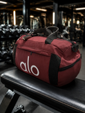 ساک ورزشی برند Alo Yoga مدل All-Day Duffel پارچه ضد آب و جادار